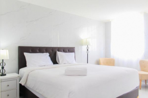 Comfort and Spacious 2BR Apartment at Tuscany Residence BSD City By Travelio